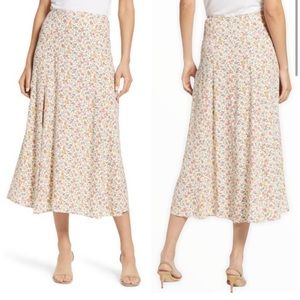 Reformation Zoe midi skirt. Size 2. Floral print. Slit.